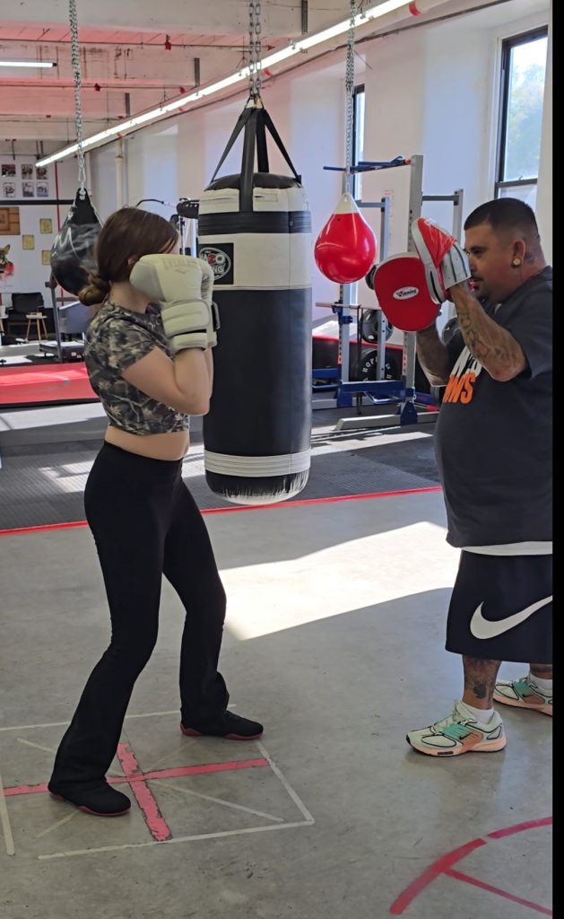 Coach Sammy training a student.